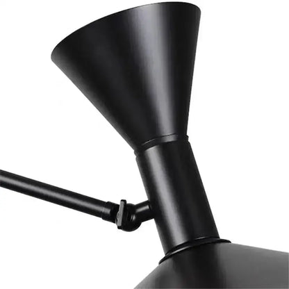 Industrial matte black rotatable wall sconce lamp with conical shade and articulated arm for bedroom lighting