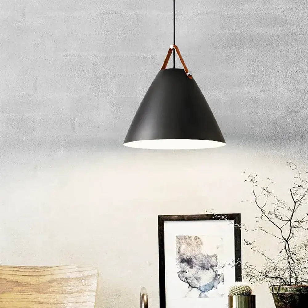 Black matte conical pendant light fixture with brown leather strap suspension ideal for kitchen lighting