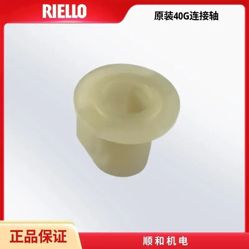 Translucent off-white plastic connector shaft by riello for industrial metallic burner oil pump brass and black kitchen accessory