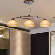 Decorbites industrial style three-light pendant fixture with amber glass shades in oil rubbed bronze finish for indoor use