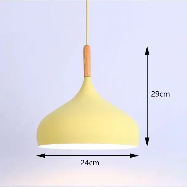 Yellow matte-finished pendant light with wooden accent and metal shade in industrial pastel kitchen brass finish