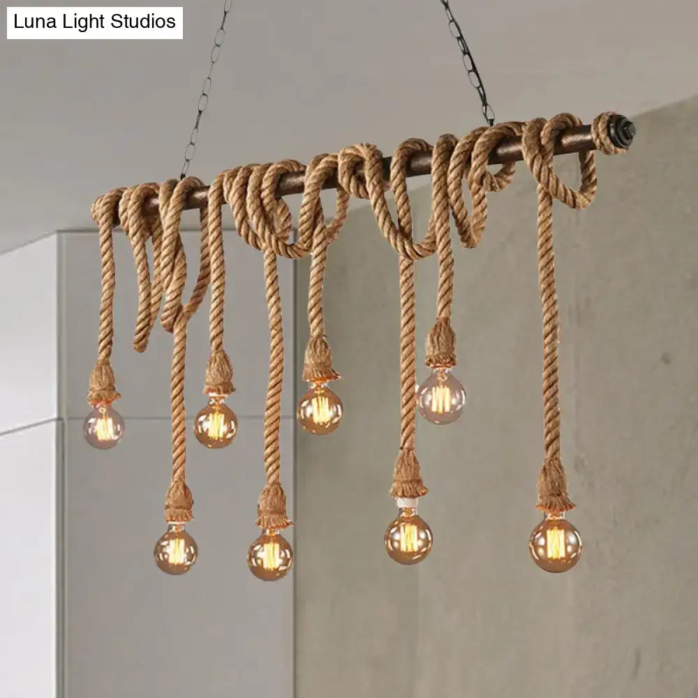 Decorbites adjustable rope exposed island light with rope-wrapped frame and glowing filament bulbs in light yellow