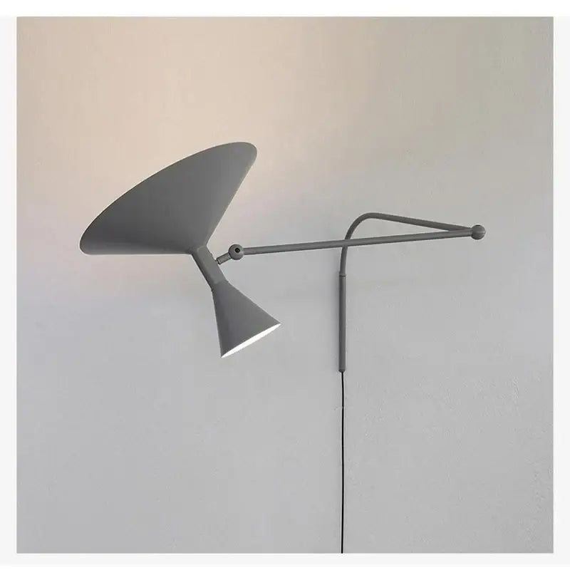 Modern gray industrial retro swing arm wall lamp with sleek articulated arm and conical shade for bedroom lighting