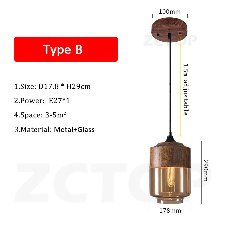 A modern led pendant light with warm amber glass shade and dark wood top for dining room light source