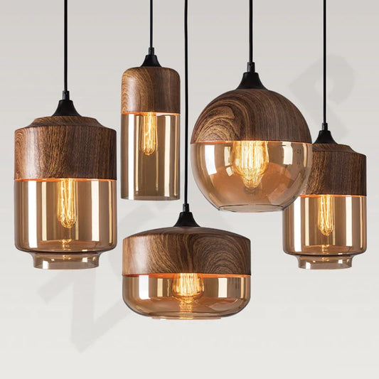 Warm-toned amber glass led pendant light with natural wood accents and exposed filament bulbs for dining room light source