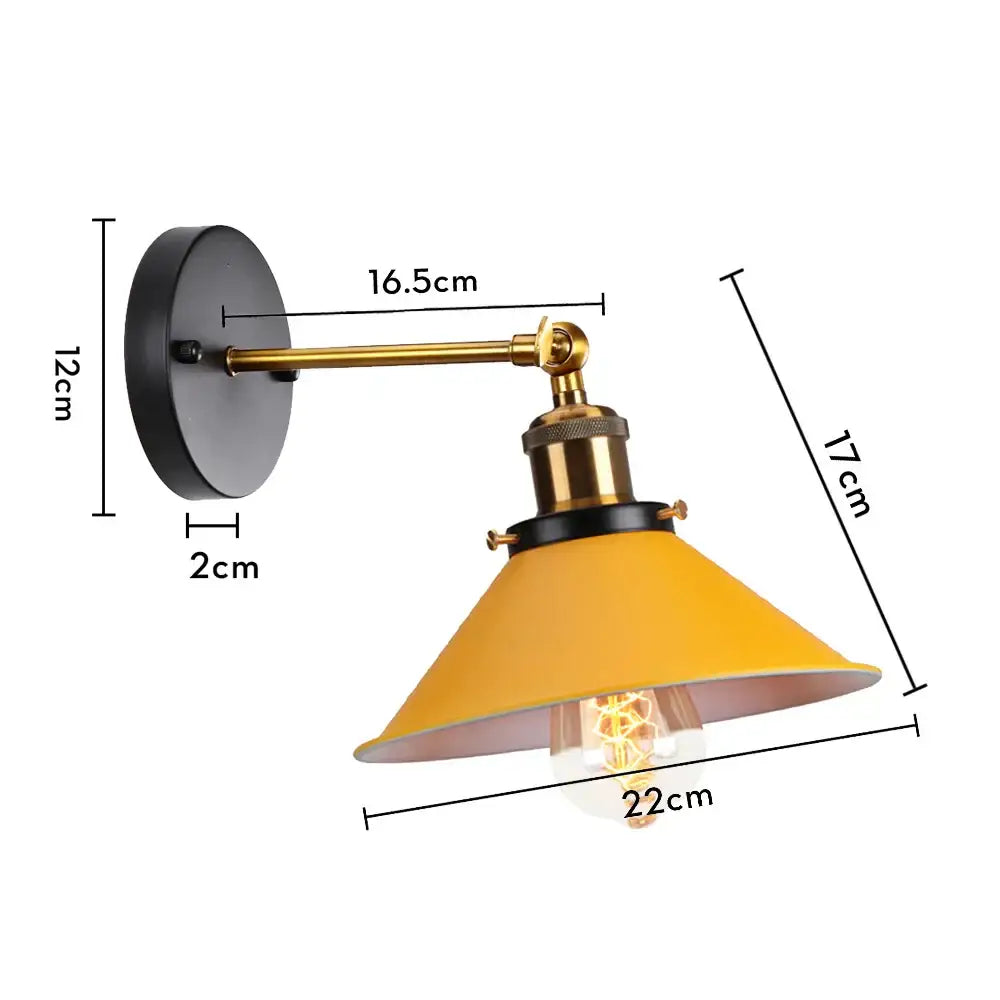 Industrial retro loft wall sconce with matte black base brass arm and yellow shade for decorbites industrial retro decor