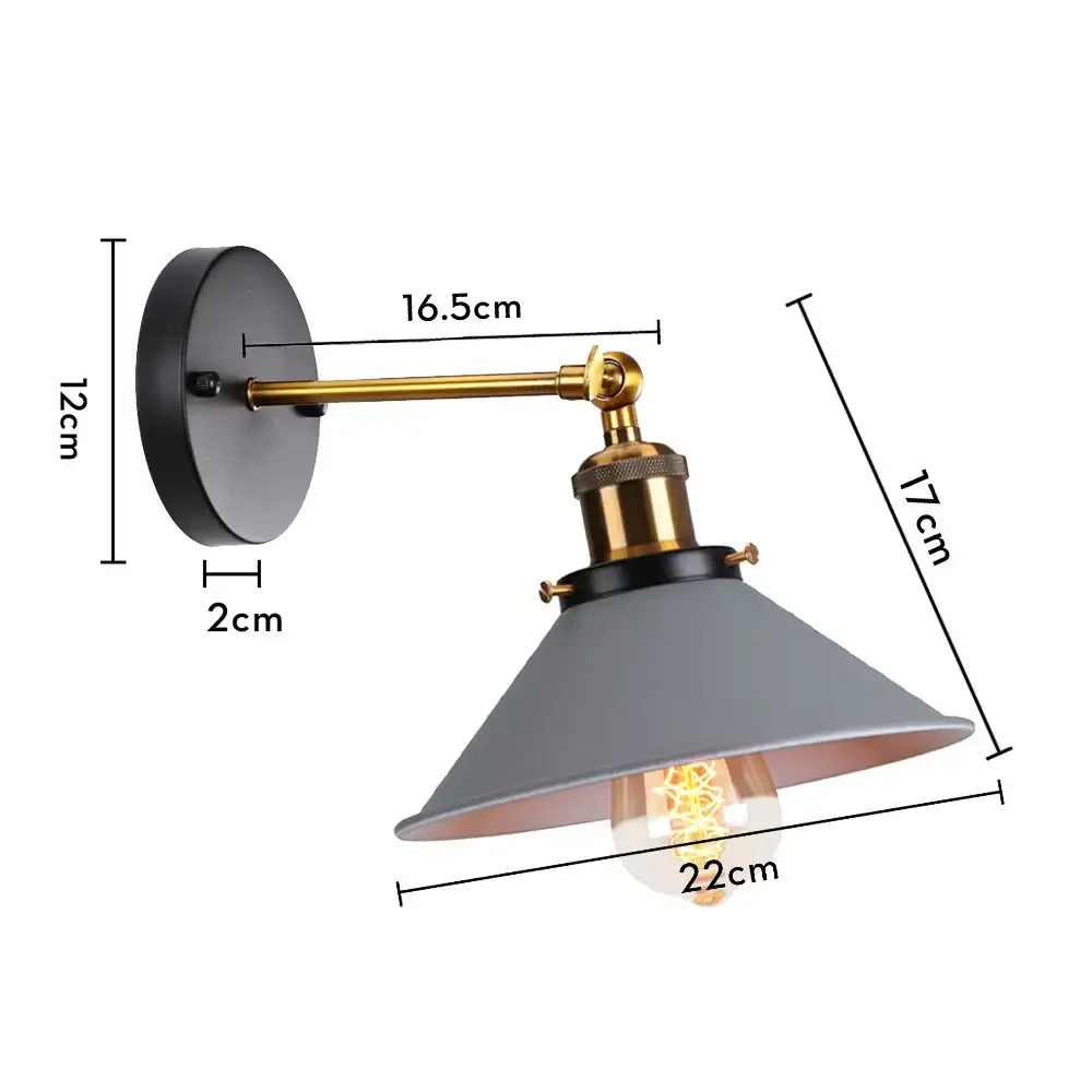 Industrial retro loft wall sconce with matte gray conical shade brass arm and exposed filament bulb decorbites industrial retro