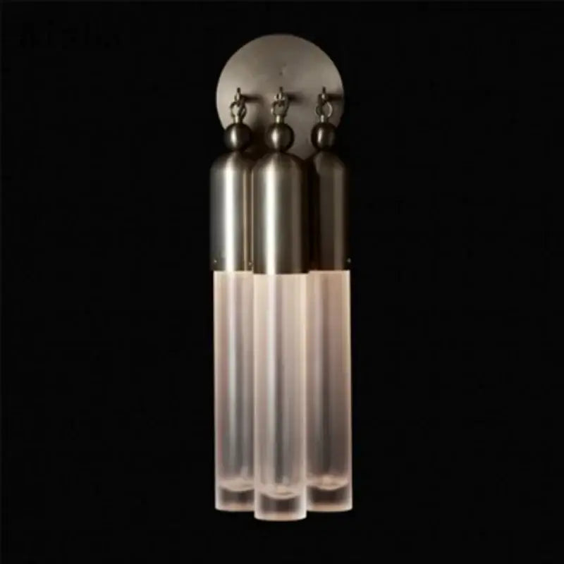 Modern industrial retro pendant lamp with three frosted glass cylindrical shades and brushed metal tops for living room decor