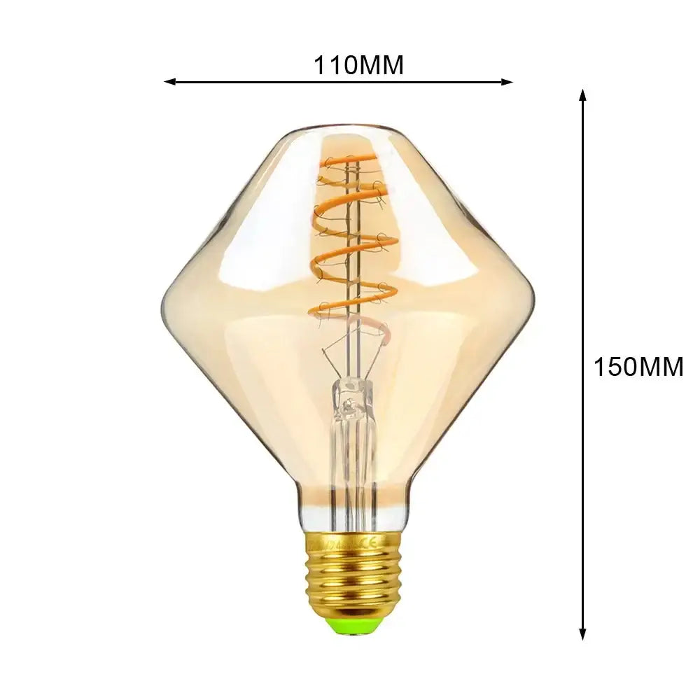A diamond-shaped amber glass industrial retro vintage led edison bulb with a gold screw base for warm living room light