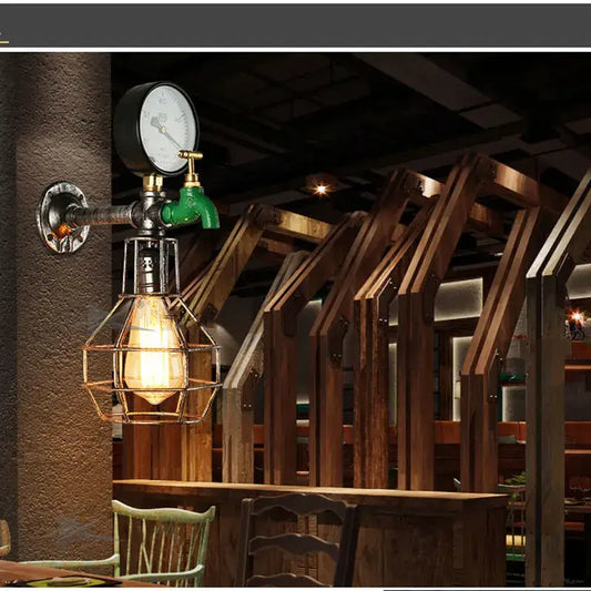 Industrial retro wall light featuring a green faucet, brass fittings, and exposed edison bulb metal cage for decorbites design