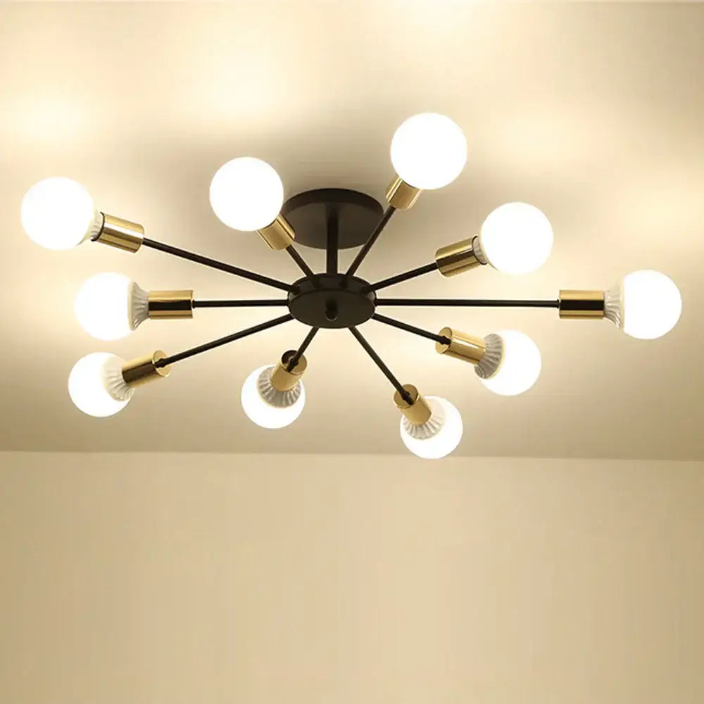 Modern black and brass starburst ceiling lamp with multiple spherical bulbs in decorbites industrial rod iron style