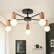 Modern black and wood-toned industrial rod iron ceiling lamp with five frosted glass globe bulbs for living room decorbites
