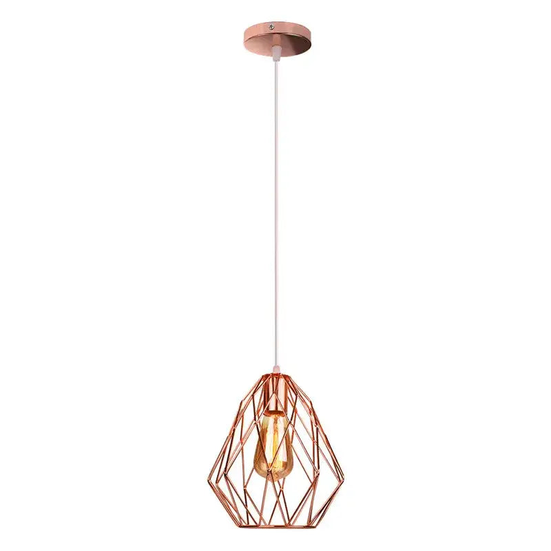 Industrial rose gold and black iron metal cage pendant light with faceted geometric design and exposed bulb for dining room decorbites iron metal