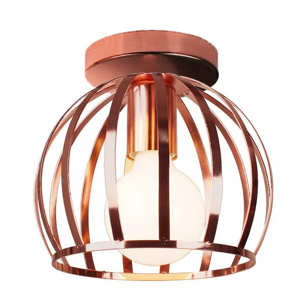 Copper-toned cage-style industrial ceiling light with frosted glass bulb for living room decorbites industrial ceiling decor