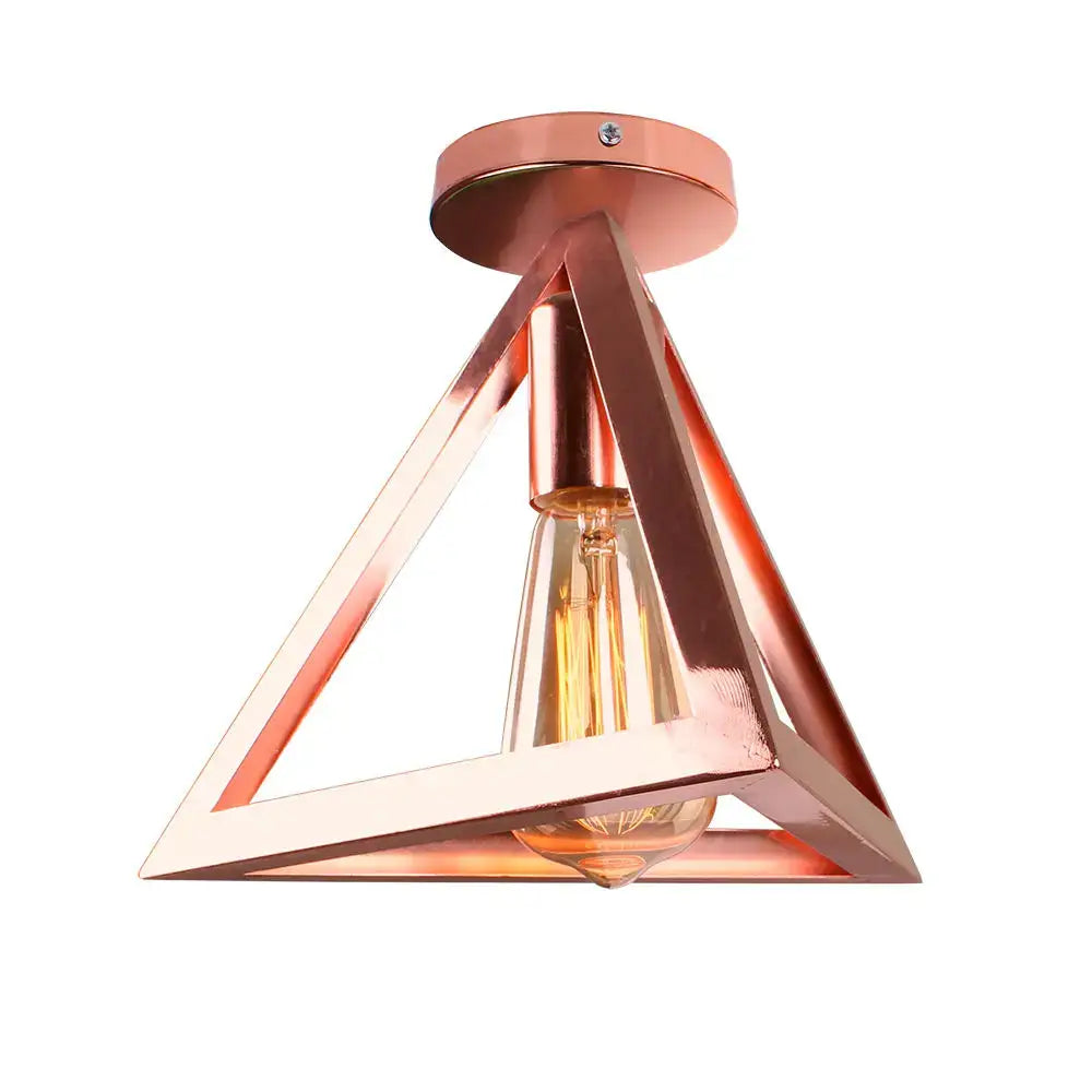 Industrial rose gold and brass ceiling light with copper-toned geometric triangular frame and exposed filament bulb for living room decorbites industrial ceiling light