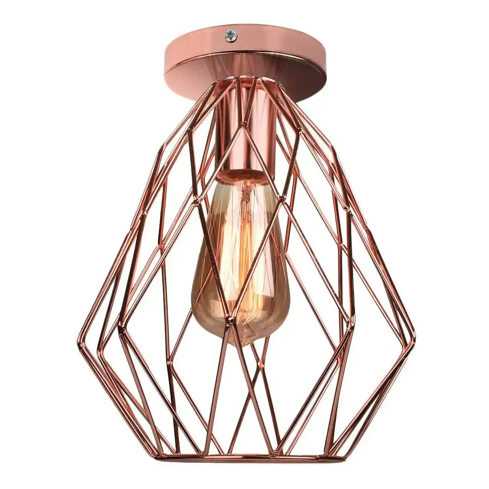 Industrial rose gold and brass ceiling light with geometric wire cage and exposed filament bulb for living room decorbites industrial ceiling