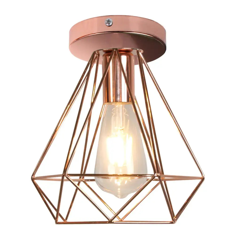 Rose gold geometric cage-style industrial ceiling light with visible filament bulb for living room decorbites industrial ceiling light