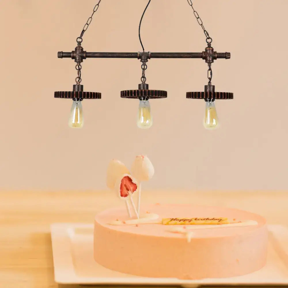 Decorbites™ industrial rust finish gear island pendant with three exposed filament bulbs in wrought iron for indoor use