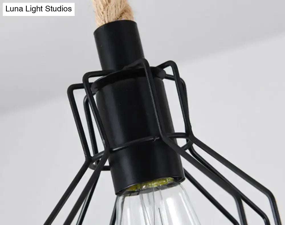 Black metal cage hemp rope chandelier with visible Edison bulb and natural fiber rope suspension for dining room lighting