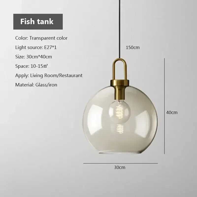 Industrial glass pendant light with transparent smoked glass globe and brass fixture featuring exposed edison bulb for dining room decorbites industrial glass pendant