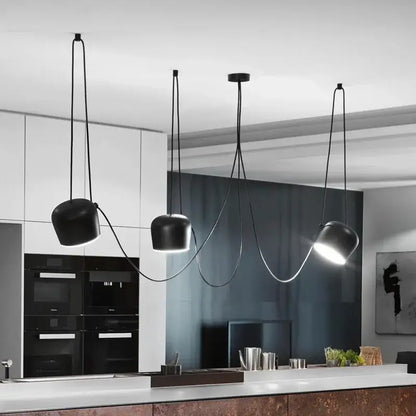 Black matte industrial spider pendant lamp with sleek curved cords and adjustable downward-facing shades for living room decorbites industrial spider pendant