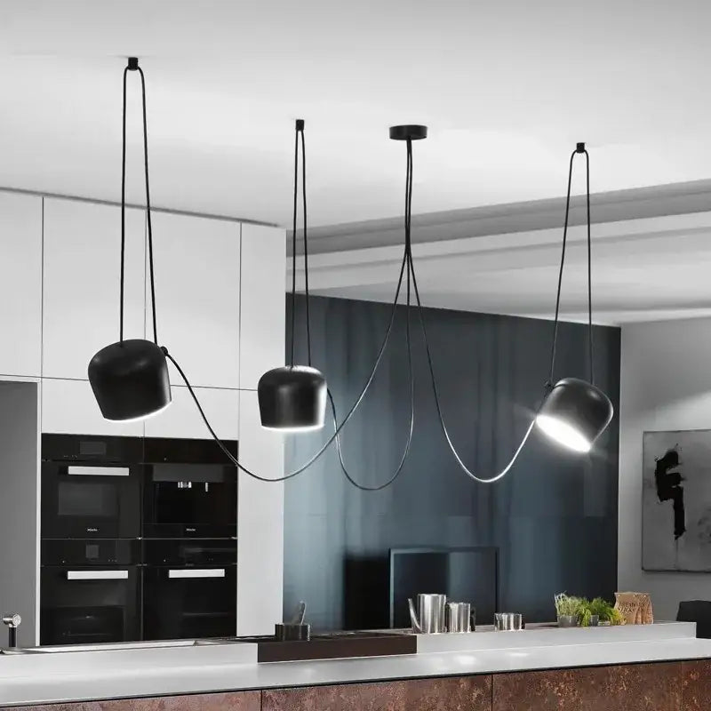 Black matte industrial spider pendant lamp with sleek curved cords and adjustable downward-facing shades for living room decorbites industrial spider pendant