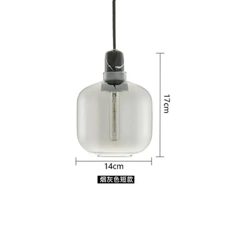 A sleek smoke-gray decorbites industrial stained glass pendant light with modern design and filament bulb for dining room
