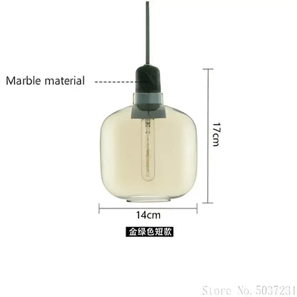 A 17cm tall industrial stained glass pendant light with translucent amber globe and black marble top cap for dining room decorbites industrial stained