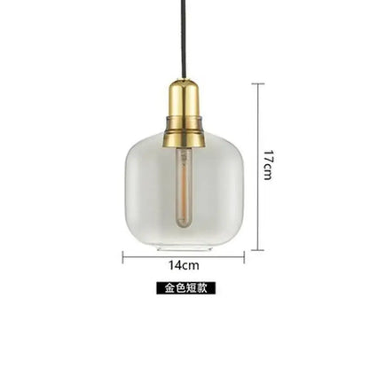 A sleek industrial stained glass pendant light with smoked glass and gold-toned metal for dining room decorbites industrial stained ambiance