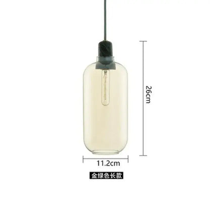 A 26cm tall decorbites industrial stained glass pendant light with translucent amber glass and black marble top cap