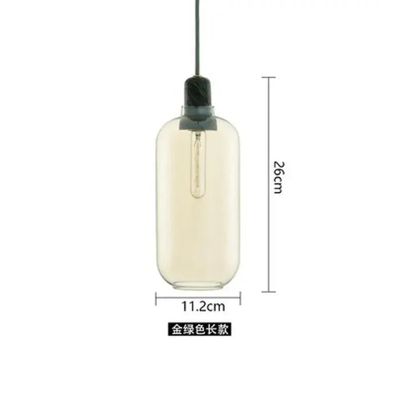 A 26cm tall decorbites industrial stained glass pendant light with translucent amber glass and black marble top cap