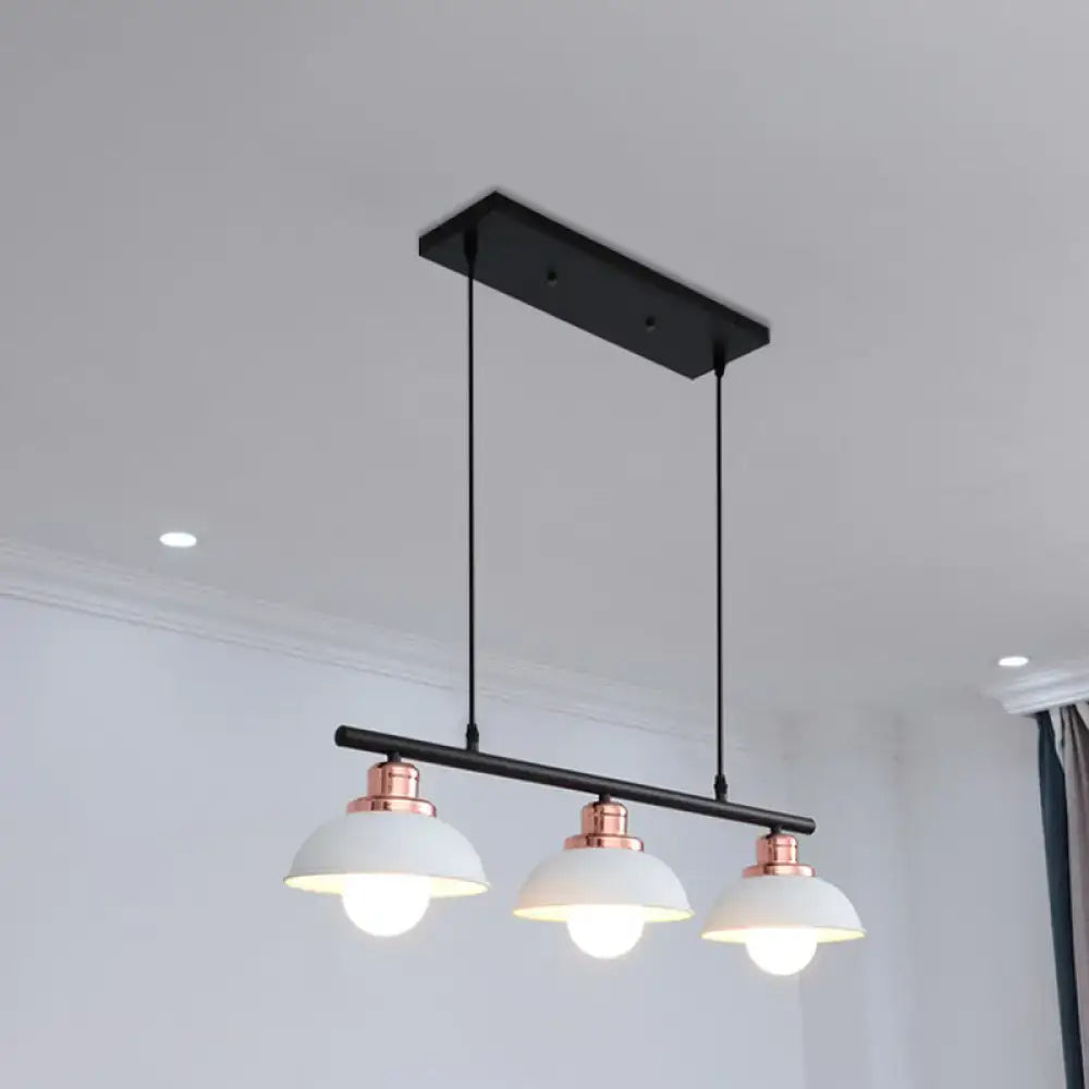 DecorBites™ industrial style light fixture with three white ceramic shades and rose gold accents in black metal