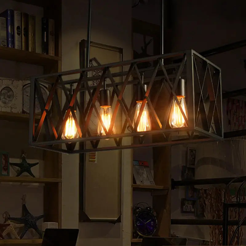Industrial style black ironwork rectangular island light with exposed filament bulbs for kitchen lighting