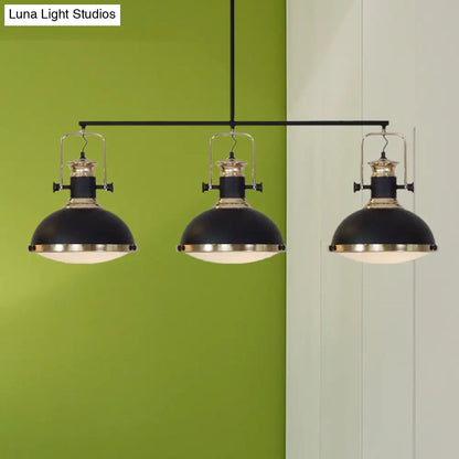 Lámpara de techo tipo isla DecorBites™ de estilo industrial, de metal negro, con difusor de vidrio y 3 cabezales