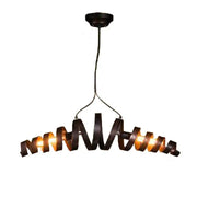 Industrial style dark bronze spiral metal pendant light with warm glowing bulbs for dining room or spiral metal island use
