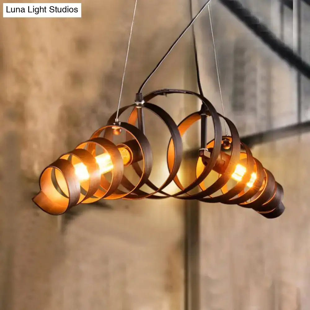 Industrial style dark bronze spiral metal pendant light with illuminated bulbs for dining room or spiral metal island use