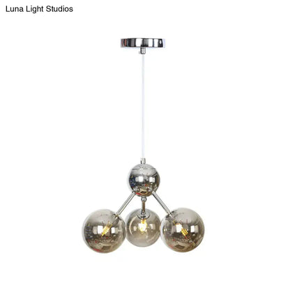 Industrial Style Hanging Chandelier Light - 13"/27.5"/34" W Orbit Shade - Amber/Clear/Smoke Gray Glass - 3/9/12 Lights
