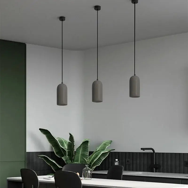 Three modern matte gray cylindrical pendant lights with black cords for decorbites industrial style led chandelier bedroom
