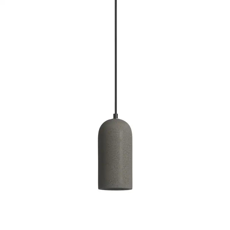 Gray concrete industrial style led pendant with sleek cylindrical design and black cord for bedroom decorbites chandelier