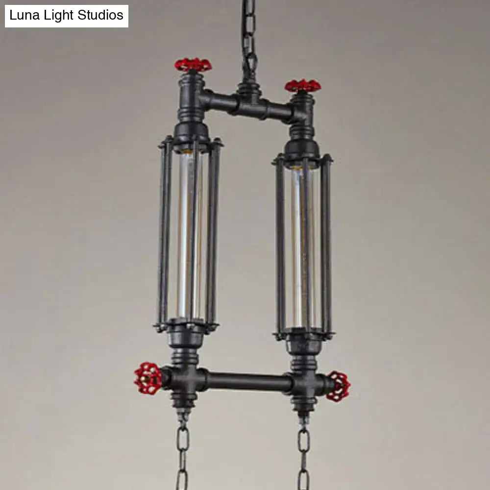 DecorBites industrial style tubular pendant light set in black metal with red valve handles and clear glass tubes for restaurants