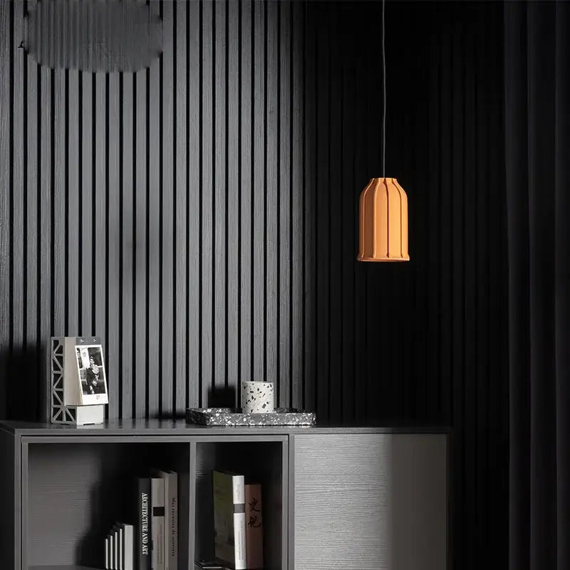 A warm orange decorbites cement pendant lamp with fluted geometric design for dining room hanging light decorbites cement