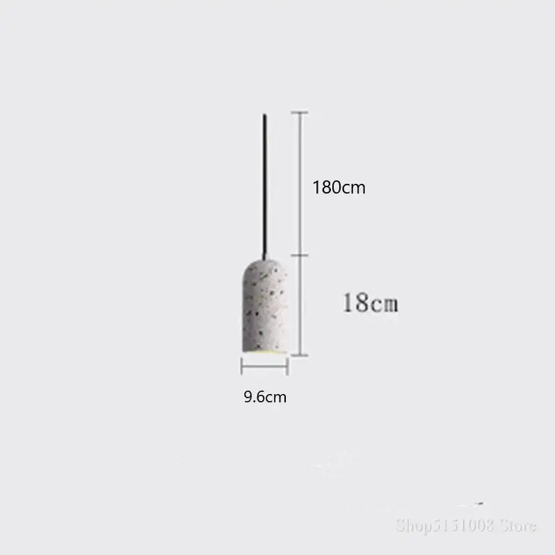 Concrete pendant light with speckled gray finish and minimalist cylindrical design in industrial terrazzo cement pendant lights