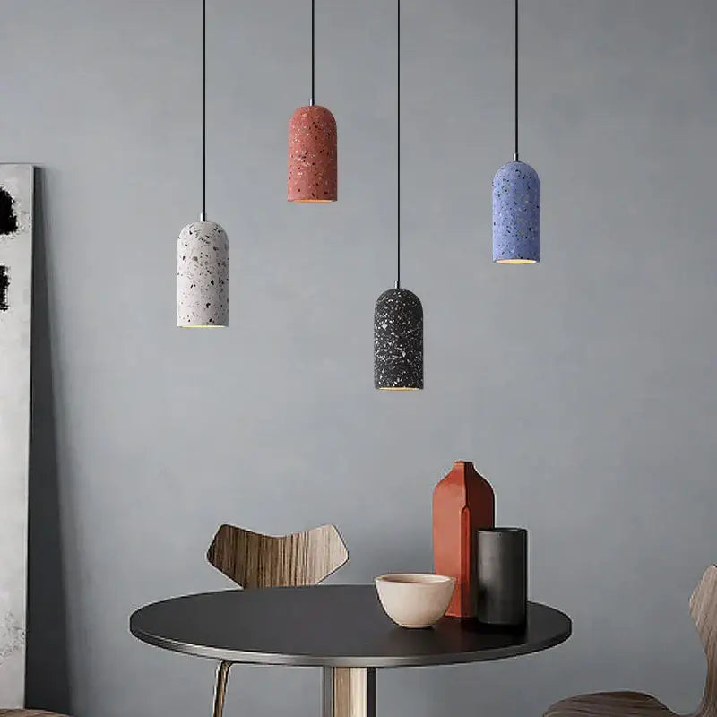 Five industrial terrazzo cement pendant lights in pink white blue and black hang for kitchen and dining room decorbites cement pendant lighting