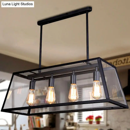 Black metal rectangular pendant island lamp with clear glass panels and four edison bulbs on chain downrods