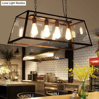 Decorbites industrial trapezoid 4-light island lamp in black with clear glass and four exposed edison bulbs