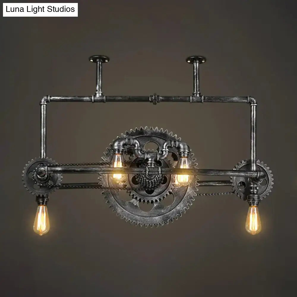 Industrial vintage black gear chandelier with dark metallic pipes and exposed edison bulbs for dining room lighting