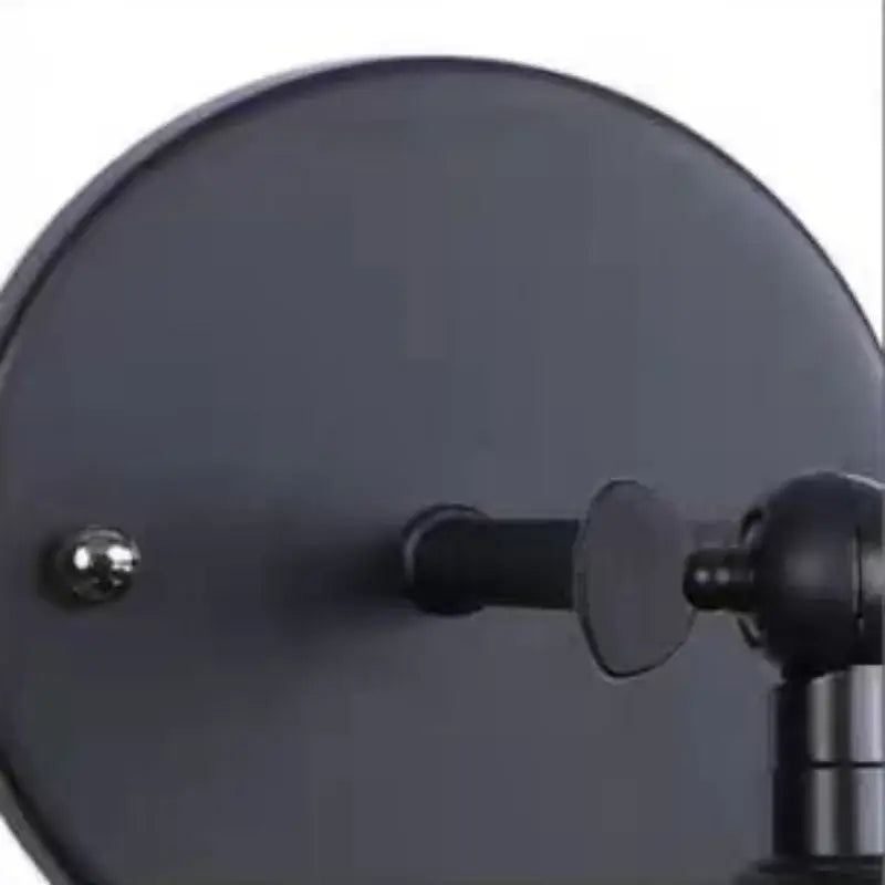 Black circular industrial vintage wall light with matte finish and metallic hardware decorbites led wall sconce