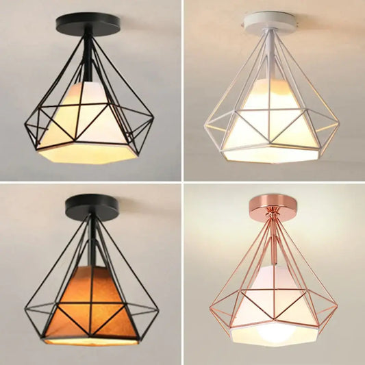 Industrial vintage ceiling light with geometric diamond shapes in black white and rose gold with frosted glass shades