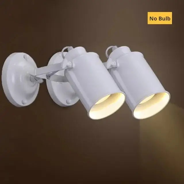 White industrial-style wall lamp with two adjustable heads matching decorbites wall lamp for bedroom lighting