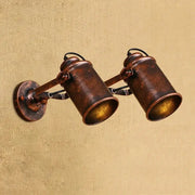 Vintage-style copper finish industrial wall lamp with two adjustable spotlight arms decorbites wall lamp design